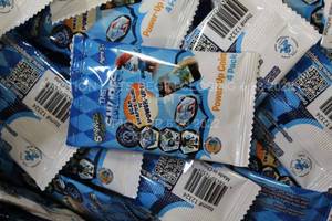 lot 94 image: Massive Lot of The Smurfs Power Up Coins Brand New Factory Sealed, Four Per Pack, Hundreds in Total