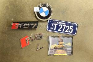 lot 272 image: Car Part Lot BMW Wheel Cap NASCAR Trading Card Audi RS7 Badge Mini Kansas 70s Motorcycle License Plate