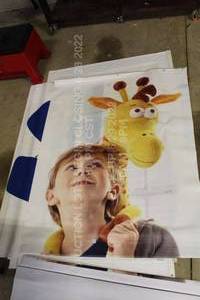 lot 333 image: Toys R Us Banner Poster Little Boy with Geoffery the Giraffe TRU Plush logo 6 3 x 4 Vinyl