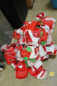 lot 447 image: Massive Lot of Christmas Stockings Red Green Babys First Christmas with Bibs and Santa Hats for Childrens 1st Christmas
