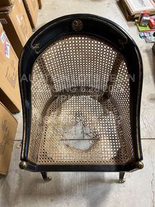 lot 243 image: Vintage Wicker and Wood Chair on Rolling Casters. Seat has a hole in it.