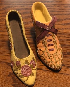 lot 56 image: 3.5 Two Collectible Designer Ceramic Shoes