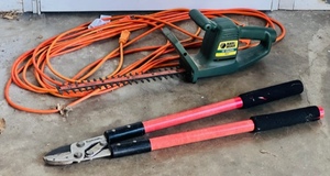 lot 86 image: Black &amp Decker 16 Electric Hedge Trimmer wExtension Cord &amp Corona Loppers FL3420