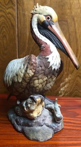lot 48 image: Brown Bisque Pelican by Andrea Sadek #6057