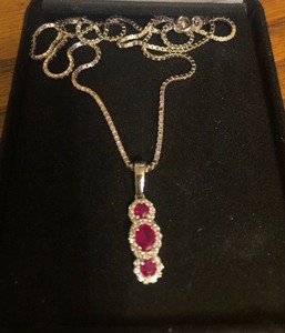 lot 126 image: .925 Sterling Silver 17.5 Chain wRuby Pendant
