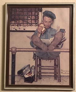lot 137 image: 15x12 Framed Norman Rockwell Print of Security Guard at the Zoo Eating Sandwich in Front of Lion&nbsp