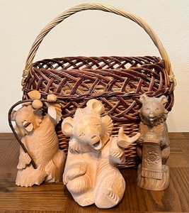 lot 162 image: Lot of 3 Hand-Carved 9 Wooden Bears From Russia - Bear Bending Branch, Holding Bouncing Bird, and at Lecturn wWicker Basket 1993