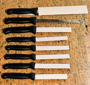 lot 295 image: 8 Piece Multi Edge Stainless Steel Knives