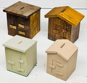 lot 33 image: LOT OF 4 HAND-CRAFTED WOODEN OUTHOUSE COIN BANKS