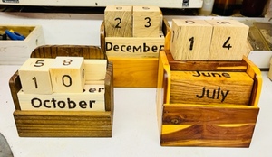 lot 34 image: LOT OF 3 HAND-CRAFTED WOODEN CALENDARS&nbsp