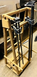 lot 149 image: TWO 30 and TWO 24 BAR CLAMPS wROLL-A-ROUND BAR CLAMP STAND