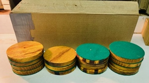 lot 283 image: LOT OF ELEVEN 3.5 HAND-CRAFTED WOODEN COASTERS