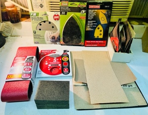 lot 284 image: HUGE LOT OF SANDPAPER DISKS, SHEETS AND BELTS