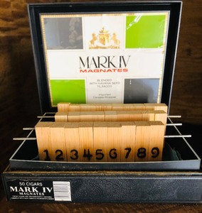 lot 265 image: 3 METAL RODS wNUMBERED BLOCKS IN A MARK IV CIGAR BOX