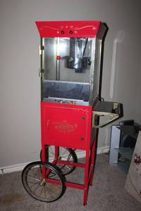 lot 2 image: Nostalia Electric Popcorn Machine with Cart