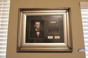 lot 3 image: Framed Abraham Lincoln Print with Strands of Hair and Piece of Flag from Coffin