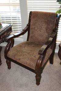 lot 35 image: Upholstered Arm Chair with Ornate Carvings, Ashley Furniture Tag, matches Lot 38