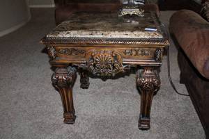 lot 46 image: Casa Mollina 28 Square Marbled top End Table, dark brown finish, has Ashley Furniture tag