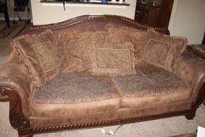 lot 47 image: Ashley Furniture Couch (75W x 33 D x 34 Tall) with mix of velvet, faux leather and paisley upholstery, includes decorative pillows
