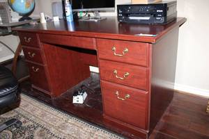 lot 57 image: Desk with Cherry finish, keyboard drawer, contents not included
