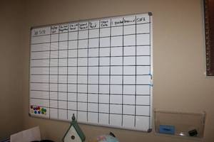 lot 61 image: White board with magnets and eraser