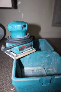 lot 84 image: Makita Finishing Sander with case