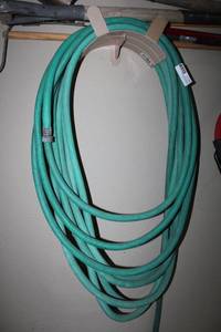lot 92 image: Garden Hoses total 3 -50ft