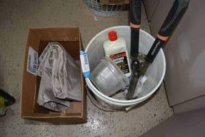lot 125 image: Fiskars Trimmer, Lighter Fluid, Tarp, and bucket