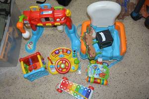 lot 115 image: Baby Lot Vtech Toys, Booster Chair, and More
