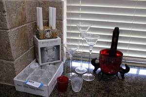 lot 21 image: Votive and Candle Lot Large Lead Crystal Votive, Stemmed Votive Set, Red Glass Candle Holder, see pictures