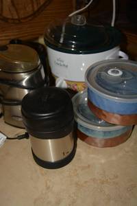 lot 17 image: Kitchen Lot Mini Crock Pots, Coffee Grinder, Microwave Travel Bowls with Lids
