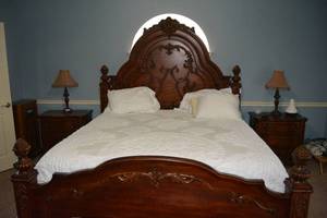lot 73 image: King Bed Frame with LARGE Ornate Headboard and Footboard,  see pictures