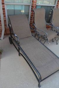 lot 209 image: Patio Cast  Metal Lounge Chair with Rolling Wheels