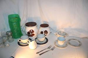 lot 10 image: Dish Sets Happy Home with Gold Pattern and Pfaltzgraff White and Blue and Green Stripe pattern and More
