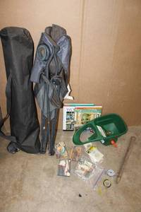 lot 11 image: Lawn Chair, Hand Held Spreader, Decorative Switch Plates and Large Spike