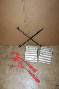lot 12 image: X wrench, Ramps (700Lb Limit - just add wood planks) and Handheld Clay Target Throwers