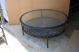 lot 76 image: 44 Round Patio Table with Glass Top and Black Metal Frame