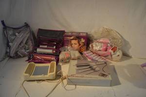 lot 45 image: Hair Care Lot Heated Rollers, Clips, Curling Irons, Mirror, and Travel Bag