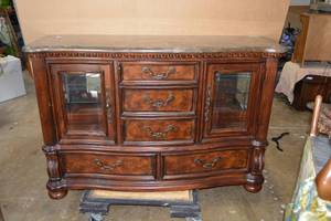 lot 52 image: Buffet Cabinet with faux marble top, felt sectioned silverware drawer and glass shelves