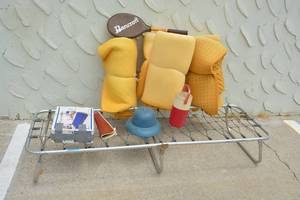 lot 81 image: Camping Lot Fold-up Cot, Foam Pads, Air Mattress, Lawn Chair, Cooler and more