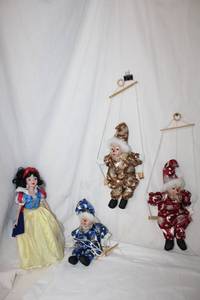 lot 197 image: Porcelain Clown Puppets AND Porcelain Snow White Doll (over 12)