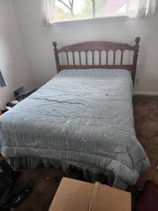 lot 68 image: Queen or Full size Bed Frame with Spindle Headboard and Metal Base Frame with Old Spice Finish