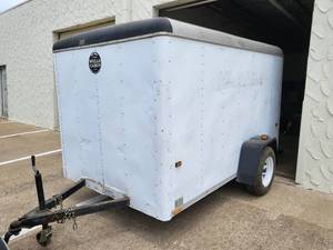 lot 2 image: Wells Cargo Trailer - 7 ft. x 10 ft.  (Lot 214 has light for trailer), Title not needed, Gross weight is 3000Lbs. Falls under the 4000 Lbs. rule.