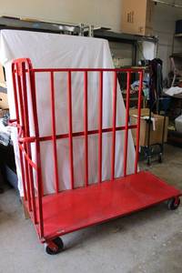 lot 42 image: Red Rolling Cart - One side marked Kelloggs, as shown