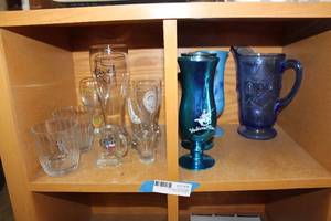 lot 76 image: Beer and Bourbon Glasses, Shot Glasses, Blue Glass Pitcher