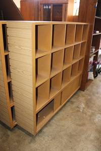 lot 62 image: 11 Square Cubbie Display Cabinet with Sliding Door Bottom Compartment both ends have J hook walls