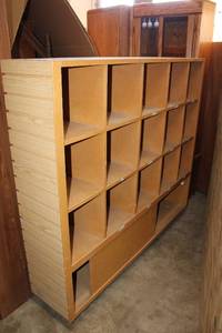 lot 63 image: 11 Square Cubbie Display Cabinet with Sliding Door Bottom Compartment both ends have J hook walls