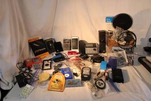 lot 135 image: Misc. Electronics Vteck Phones, Radios, Blackjack Game, Phone Covers and more