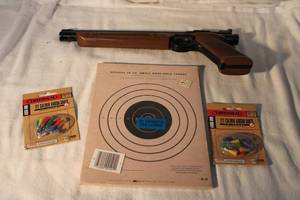 lot 169 image: American Classic Air Pistol with Paper Targets and Airgun Darts