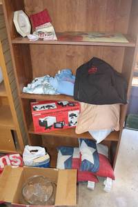 lot 191 image: Misc. Lot Small bag of clothes, Texas Throw Pillows, Glass Cutting Board, Punch Bowl Set, Video Transfer System